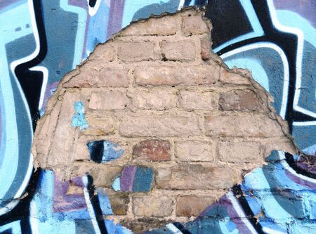 Grunge  brick wall with old paintのeditorial素材