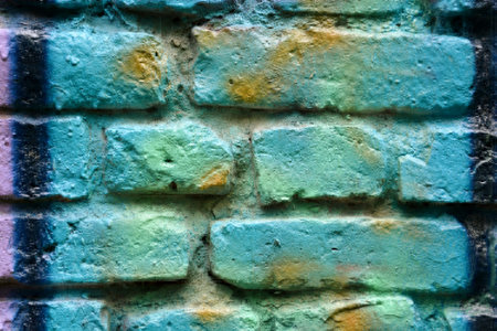 Grunge  brick wall with old paintのeditorial素材