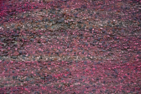 Colorfully painted stone wall as background