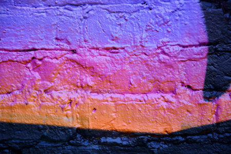 Colorfully painted stone wall as background