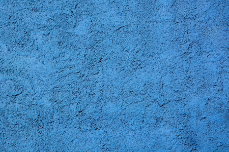 Colorfully painted stone wall as background