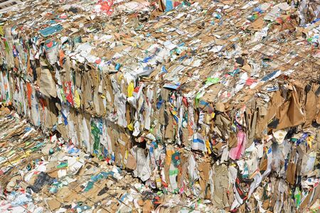 Used paper and cardboard compressed for recyclingのeditorial素材