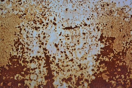 Grunge rusty metal surface as colorful abstract backgroundの写真素材