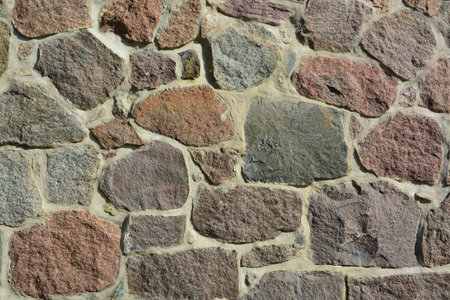 Urban stone wall with abstract pattern as creative background