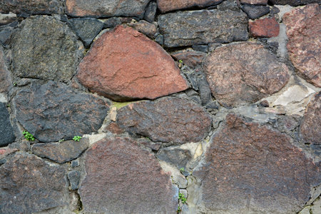 Urban stone wall with abstract pattern as creative background