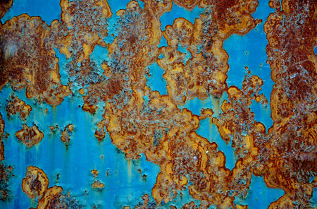 Grunge rusty metal surface as colorful abstract background