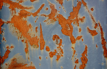 Grunge rusty metal surface as colorful abstract background