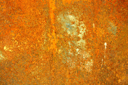 Grunge rusty metal surface as colorful abstract background