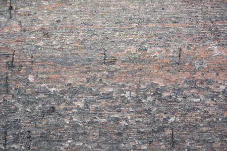 Grunge old urban brick wall as creative background