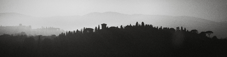Florence, Italy.Hilly landscapes. On black and white background reflects the silhouette of the landscape.の写真素材