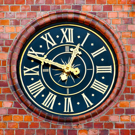 Antique clock on a town hall in old city