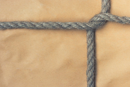 A parcel is bandaged by a rope