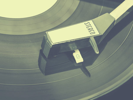 The stylized photo of an old turntable