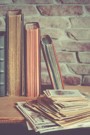 Old family photo albums  and a stack of photos
