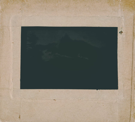 Old glass negativity in a cardboard frame