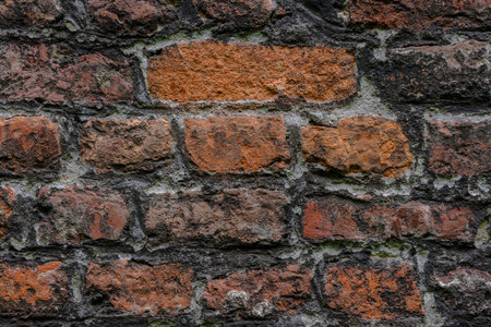 Fragment of a brickwork of an old rural house