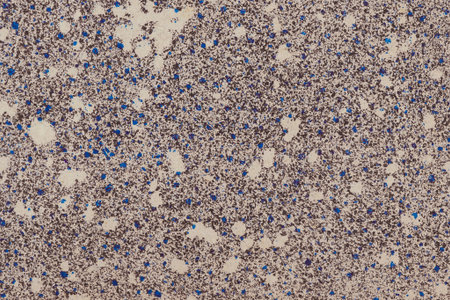 Texture of an old paper sheet with colorful splashes