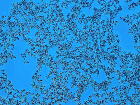 The texture of frozen glass with ice flakes is taken in close-up