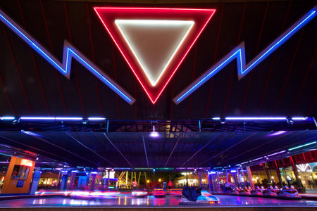 Bumper cars in motion in amusement park. The Wiener Prater Park, Vienna, Austria.のeditorial素材