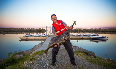 fisherman catch big fishの写真素材