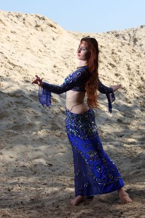 Belly dancer on the sandの写真素材