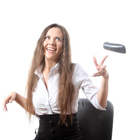 Businesswoman throw a phoneの写真素材
