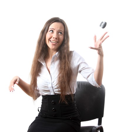 Businesswoman throw a phoneの写真素材