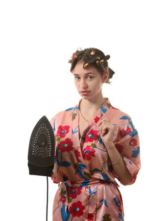 Attractive housewife with ironの写真素材