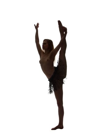 The silhouette of young attractive naked womanの写真素材