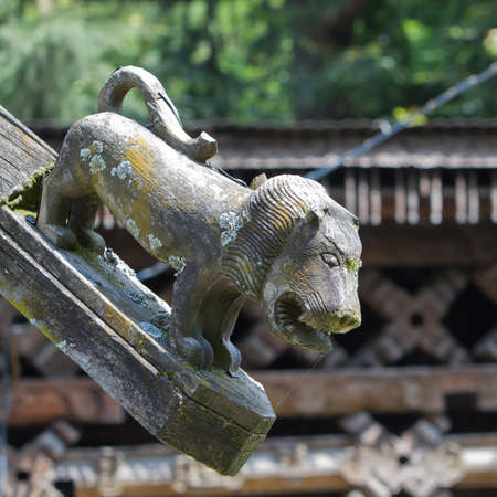 Wood lion on the roof of the temple near Manaliのeditorial素材