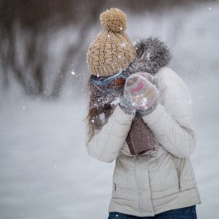 Girl playing in the snow