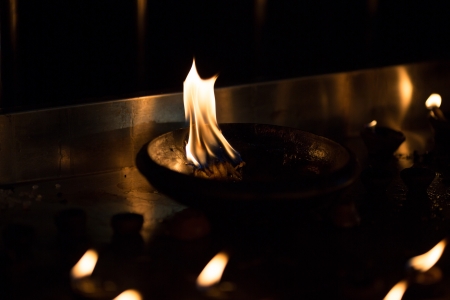 Oil lamps in a tibetan buddhist templeの写真素材