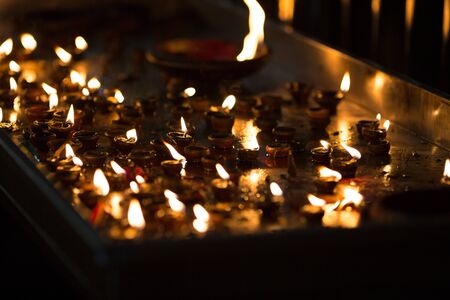 Oil lamps in a tibetan buddhist templeの写真素材
