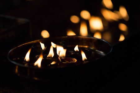 Oil lamps in a tibetan buddhist templeの写真素材