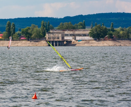 Windsurfer fell off the board in the waterのeditorial素材