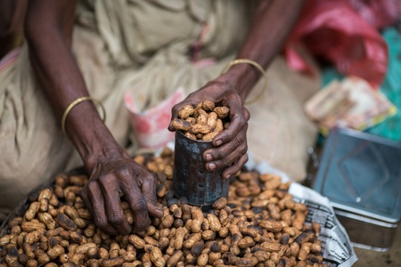 A pile of peanuts in the marketの写真素材
