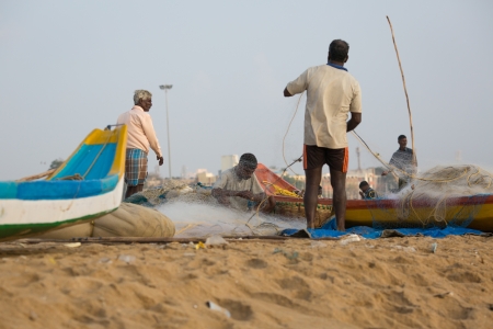 CHENAI, INDIA - FEBRUARY 10  Indian fisherman on the Marina beach at morningのeditorial素材