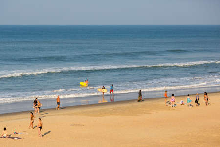Surfing in the Indian Ocean near the town of Varkalaのeditorial素材