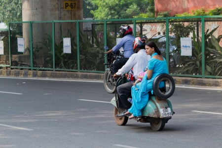 Motorcyclist on the street of Indian townのeditorial素材