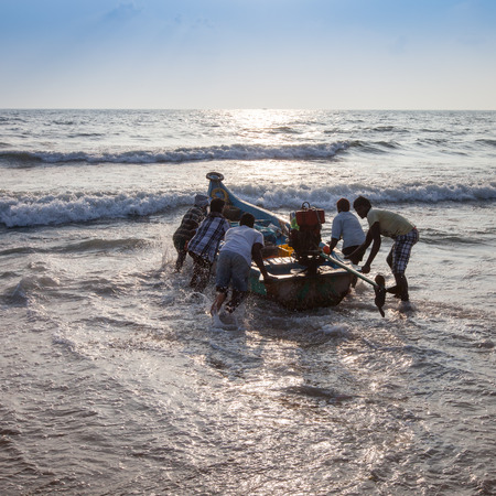 CHENNAI, INDIA-FEBRUARY 10: Fishermen on the beach Marina Beach on February 10, 2013 in Chennai, India. The beach runs from near Fort St. George in the north to Besant Nagar in the south, a distance of 13Â km.のeditorial素材