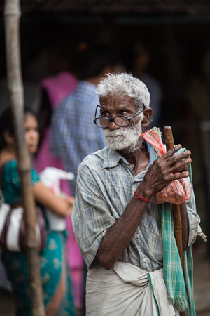 TRICHY, INDIA-FEBRUARY 14: Street of Indian city 14, 2013 in Trichy, India. People on the street of...