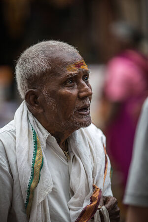 TRICHY, INDIA-FEBRUARY 14: Street of Indian city 14, 2013 in Trichy, India. People on the street of indian townのeditorial素材