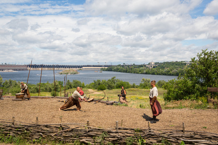 ZAPORIZHIA, UKRAINE-JUNE 21: Ukrainian Cossacks 21, 2014 in Zaporizhia, Ukraine. Show of Ukrainian Cossacks in Cossacks Museum on the island of Khortytsyaのeditorial素材