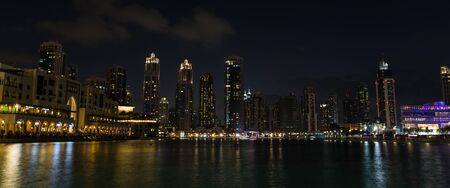 View of the skyscrapers of Dubai at nightのeditorial素材