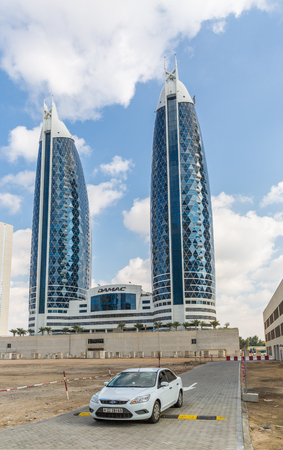 DUBAI, UAE-JANUARY 16: Skyscrapers in the city center on January 16, 2014 in Dubai, UAE. Modern skyscrapers in the city center.のeditorial素材