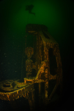 Flooded crane at the bottom of the quarry "Dibrovi" near the town of Korostenの写真素材