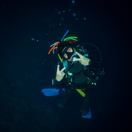 The scuba diver blows the air ringsの写真素材