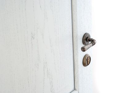 Open white wooden door. Entrance to the roomの写真素材