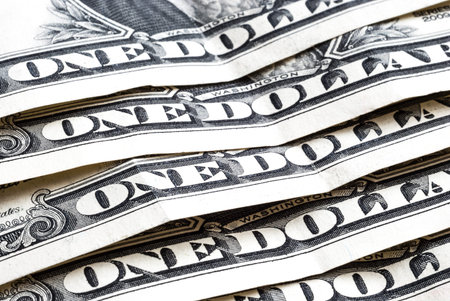 Five one-dollar bills, with the inscription one dollar