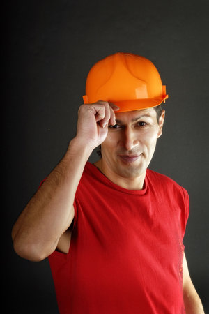 man in red tanktop and in defensive send